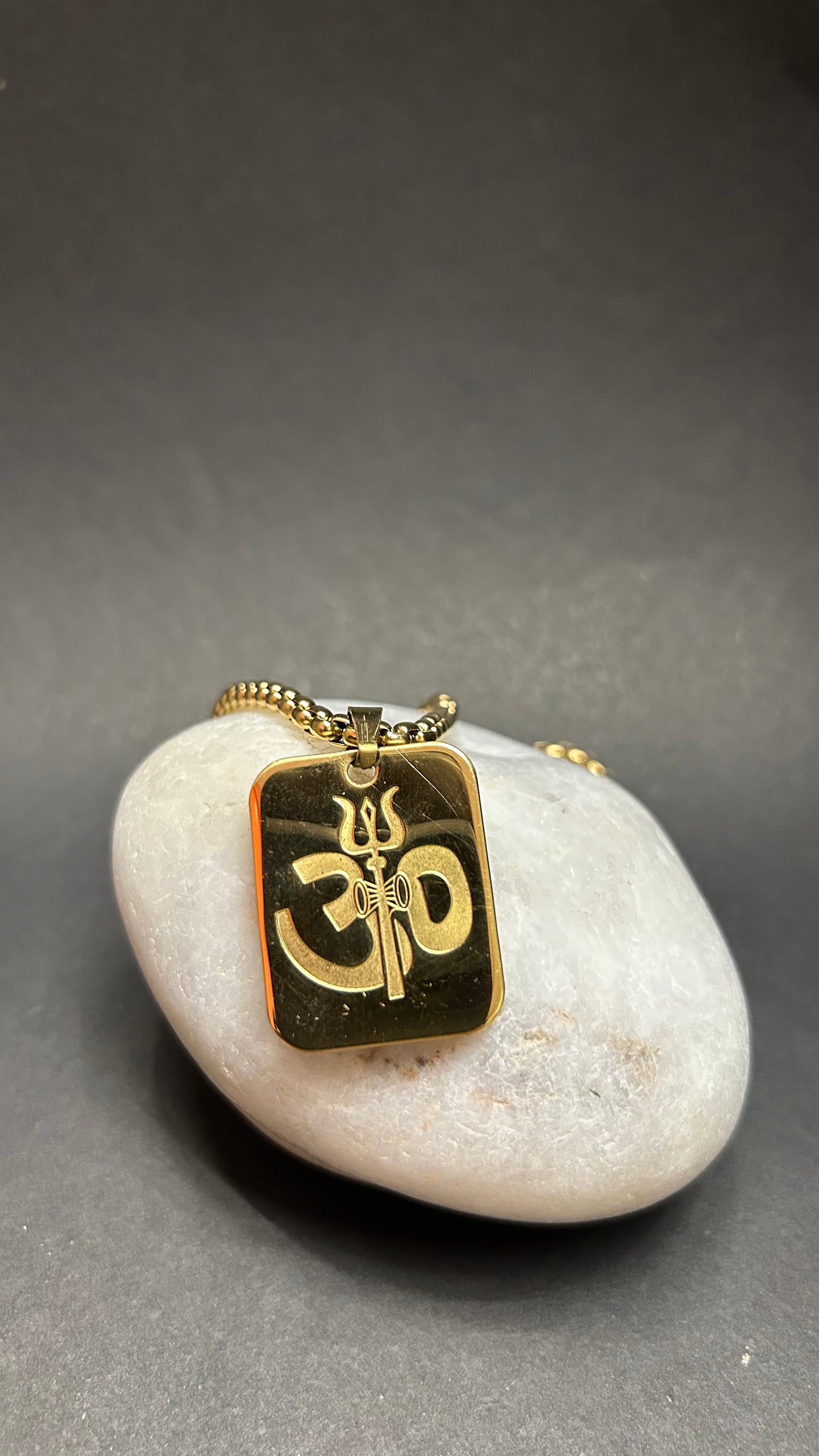 Divine Edge: Golden Stainless Steel Om Trishul Necklace